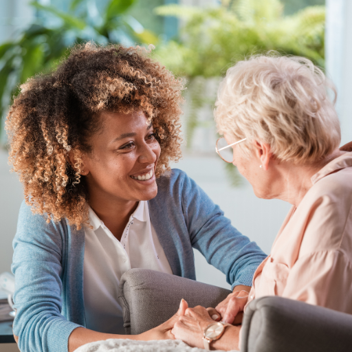 MiLuxe support worker providing emotional reassurance to an older adult.
